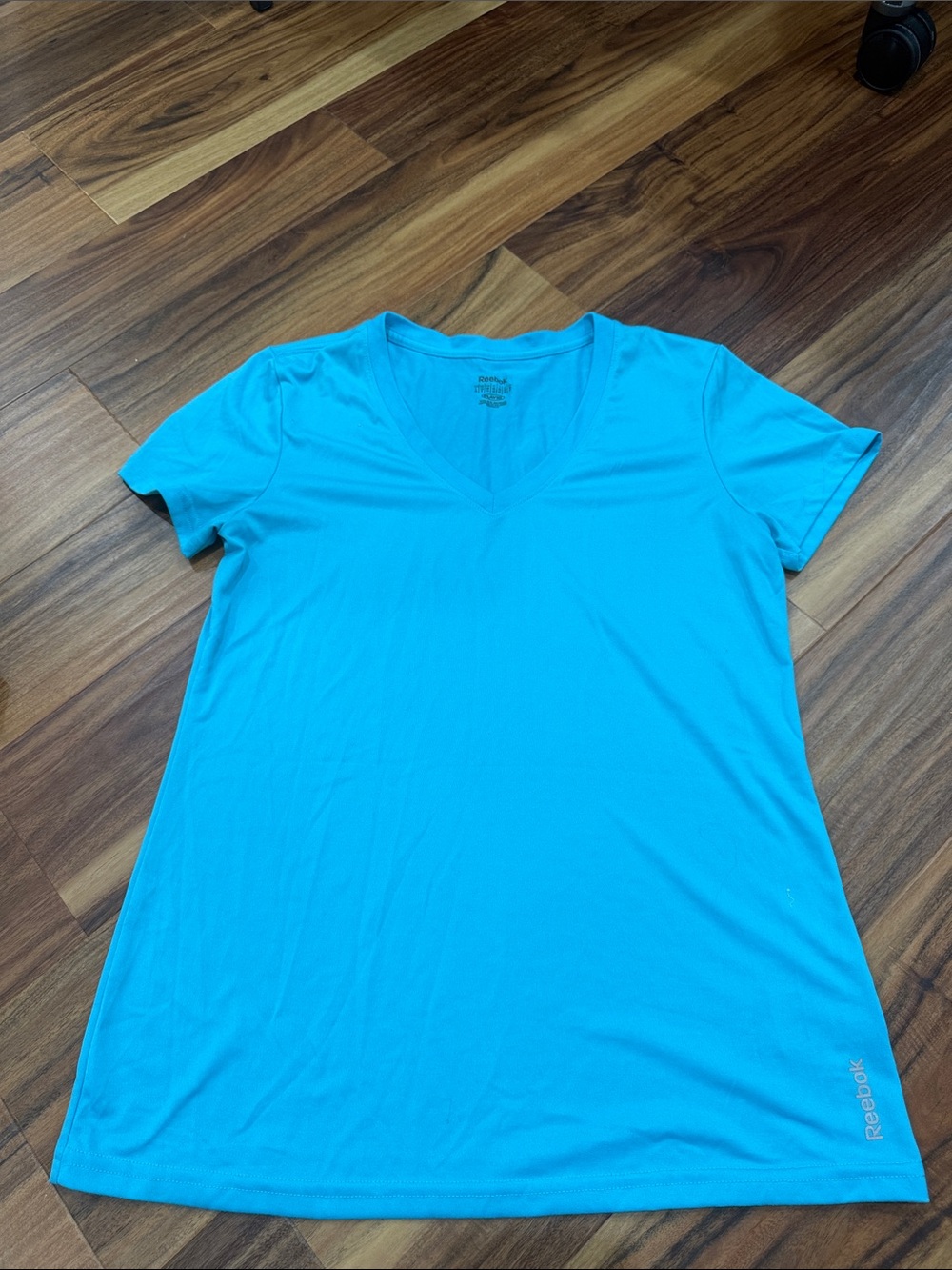 Reebok Women’s V-Neck Short Sleeve Tee — Turquoise Blue